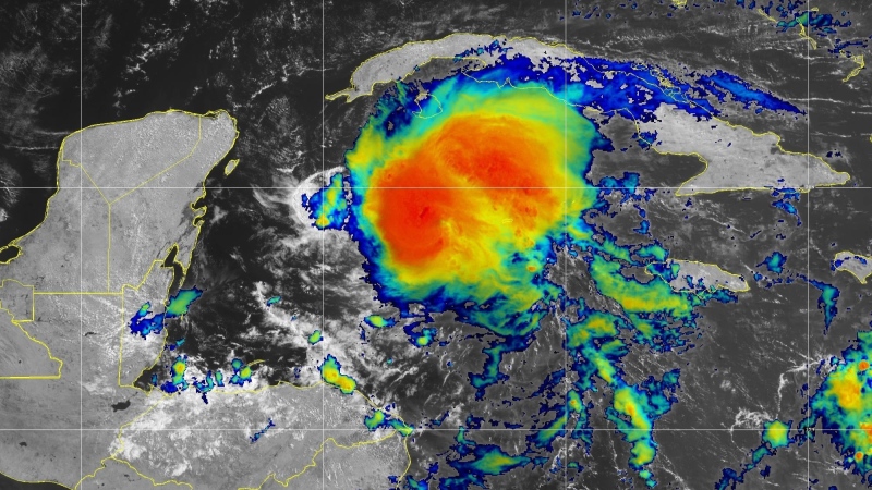 Hurricane Beryl churns in the Caribbean Sea, seen moving away from the Cayman Islands still with intense winds, at about 11:30 a.m. EDT July 4, 2024. (NOAA)