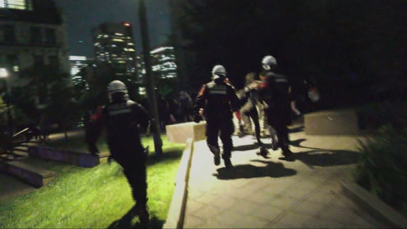 Montreal police descend on McGill University to disperse a crowd of protesters on Friday, July 5, 2024. (CTV News)