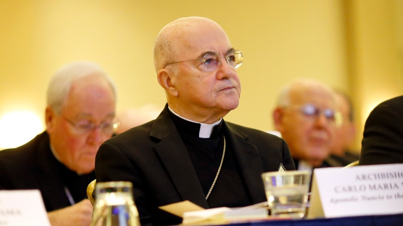FILE - Archbishop Carlo Maria Vigano, Apostolic Nuncio to the U.S., listens to remarks at the U.S. Conference of Catholic Bishops' annual fall meeting in Baltimore, Nov. 16, 2015. (AP Photo/Patrick Semansky, File)