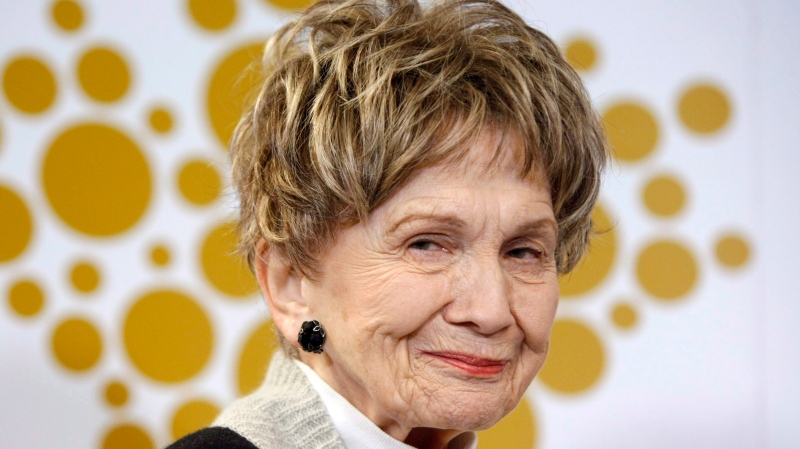 Alice Munro attends a ceremony for the unveiling of her pure silver five-dollar coin on March 24, 2014. Munro's daughter says her mother kept silent about her stepfather sexually abusing her. (Chad Hipolito/The Canadian Press)