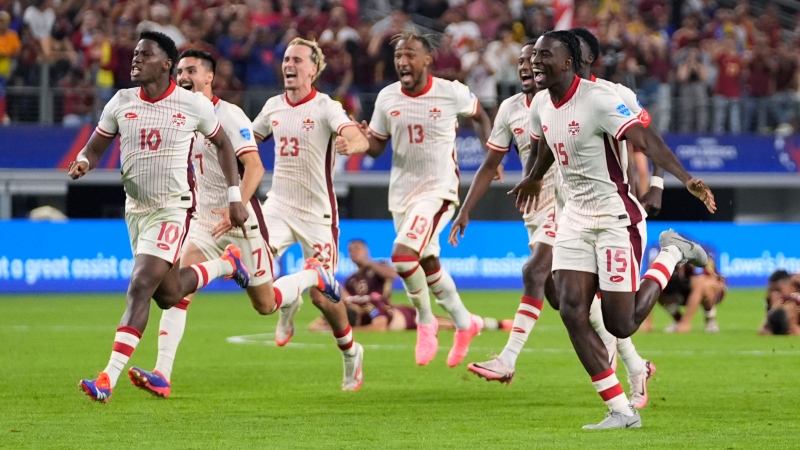 Canada celebrates their win in a Copa America quarterfinal soccer match against Venezuela in Arlington, Texas, Friday, July 5, 2024. (AP Photo/Tony Gutierrez)