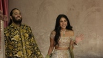 Anant Ambani, left, and Radhika Merchant pose for photographers during their pre-wedding ceremony in Mumbai, India, Friday, July 5, 2024. (AP Photo/Rajanish Kakade, File)